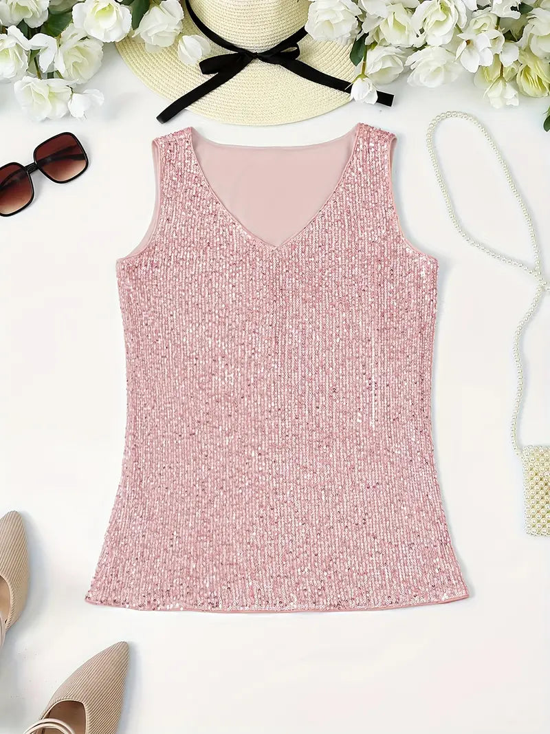 "Mouwloze top met V-hals, pailletten, elegante uitstraling, lichte stof; perfect voor zomer en avondjes uit."
