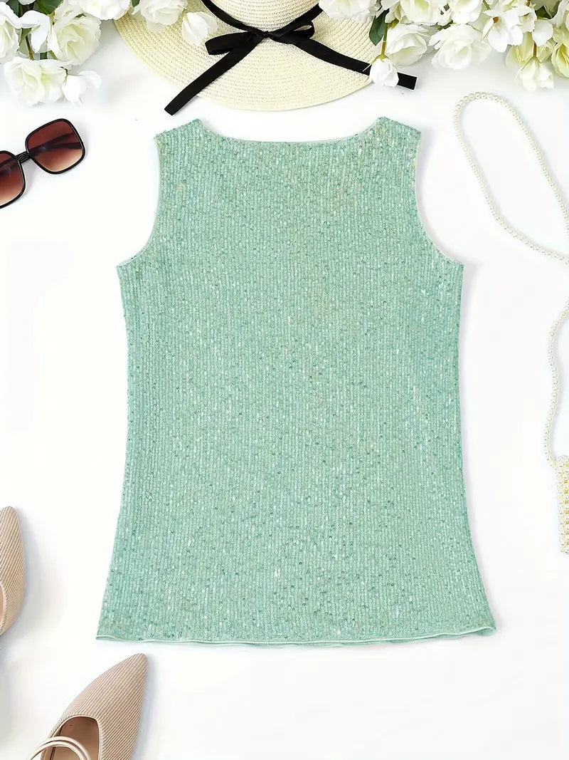 "Mouwloze top met V-hals, pailletten, elegante uitstraling, lichte stof; perfect voor zomer en avondjes uit."