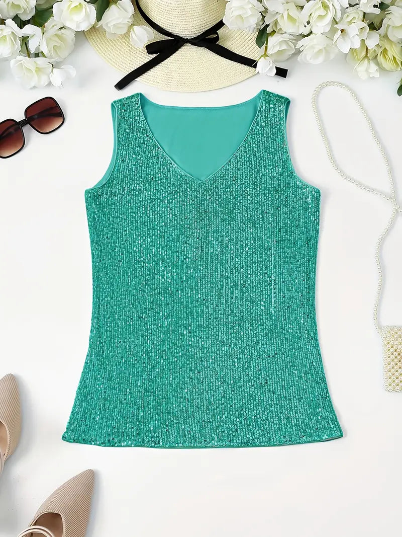 "Mouwloze top met V-hals, pailletten, elegante uitstraling, lichte stof; perfect voor zomer en avondjes uit."