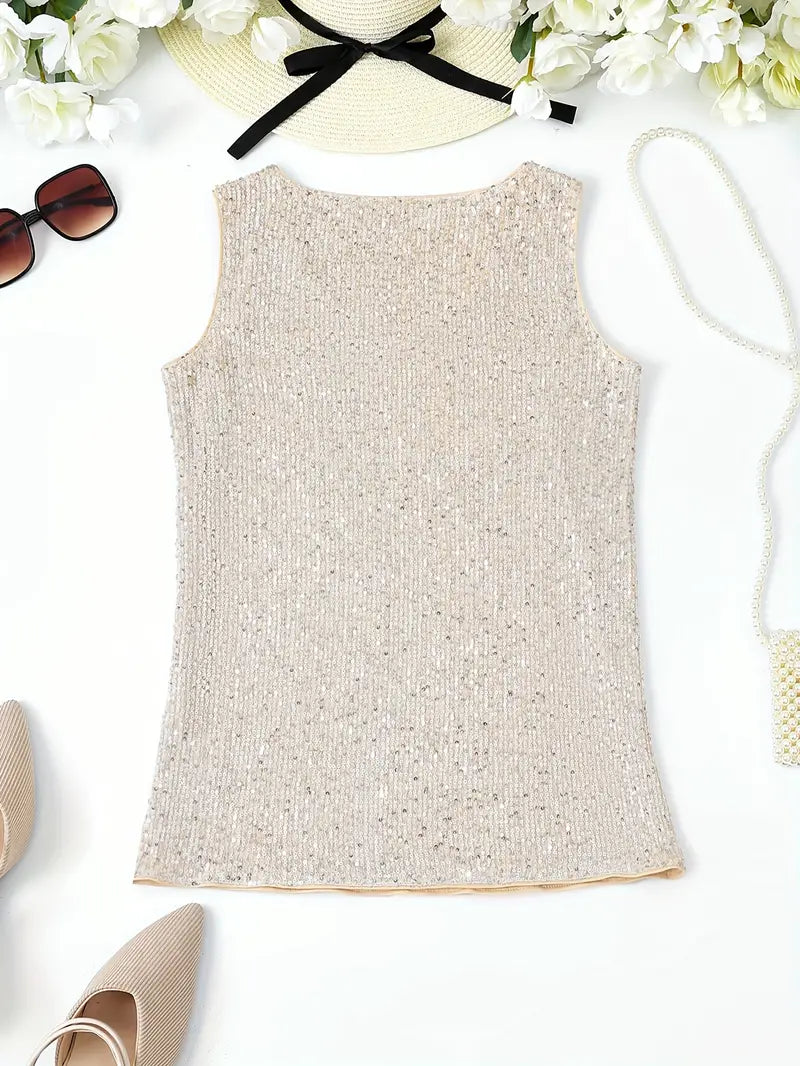 "Mouwloze top met V-hals, pailletten, elegante uitstraling, lichte stof; perfect voor zomer en avondjes uit."