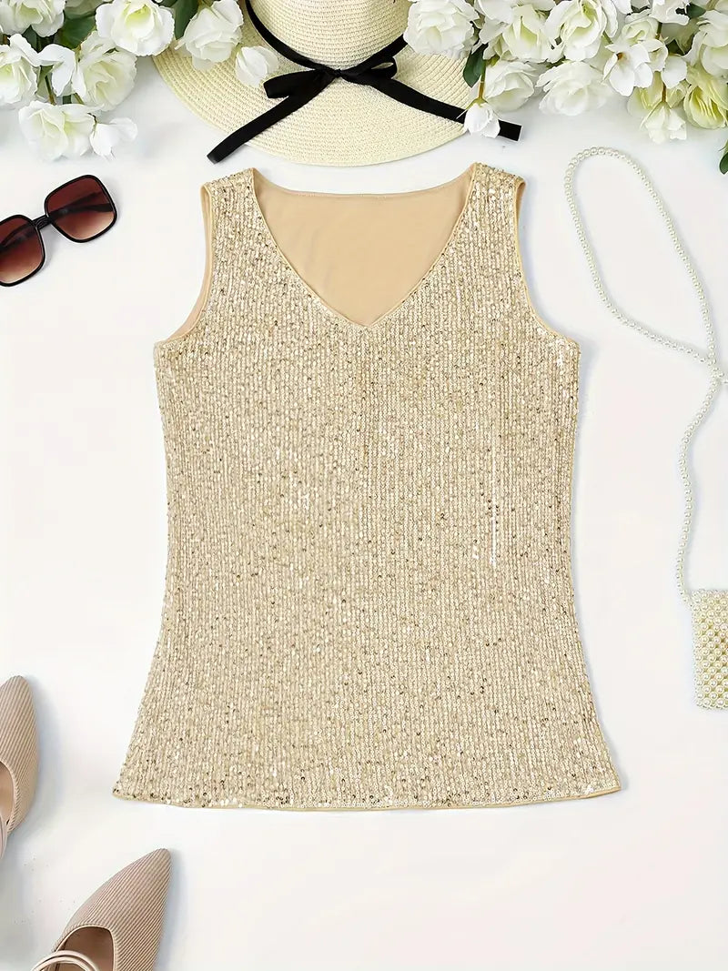 "Mouwloze top met V-hals, pailletten, elegante uitstraling, lichte stof; perfect voor zomer en avondjes uit."