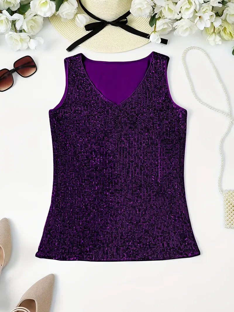 "Mouwloze top met V-hals, pailletten, elegante uitstraling, lichte stof; perfect voor zomer en avondjes uit."