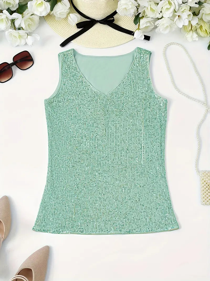 "Mouwloze top met V-hals, pailletten, elegante uitstraling, lichte stof; perfect voor zomer en avondjes uit."