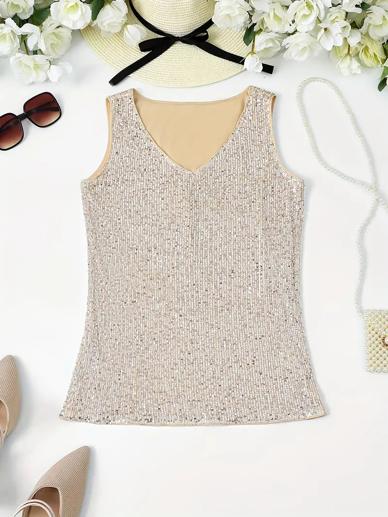 "Mouwloze top met V-hals, pailletten, elegante uitstraling, lichte stof; perfect voor zomer en avondjes uit."