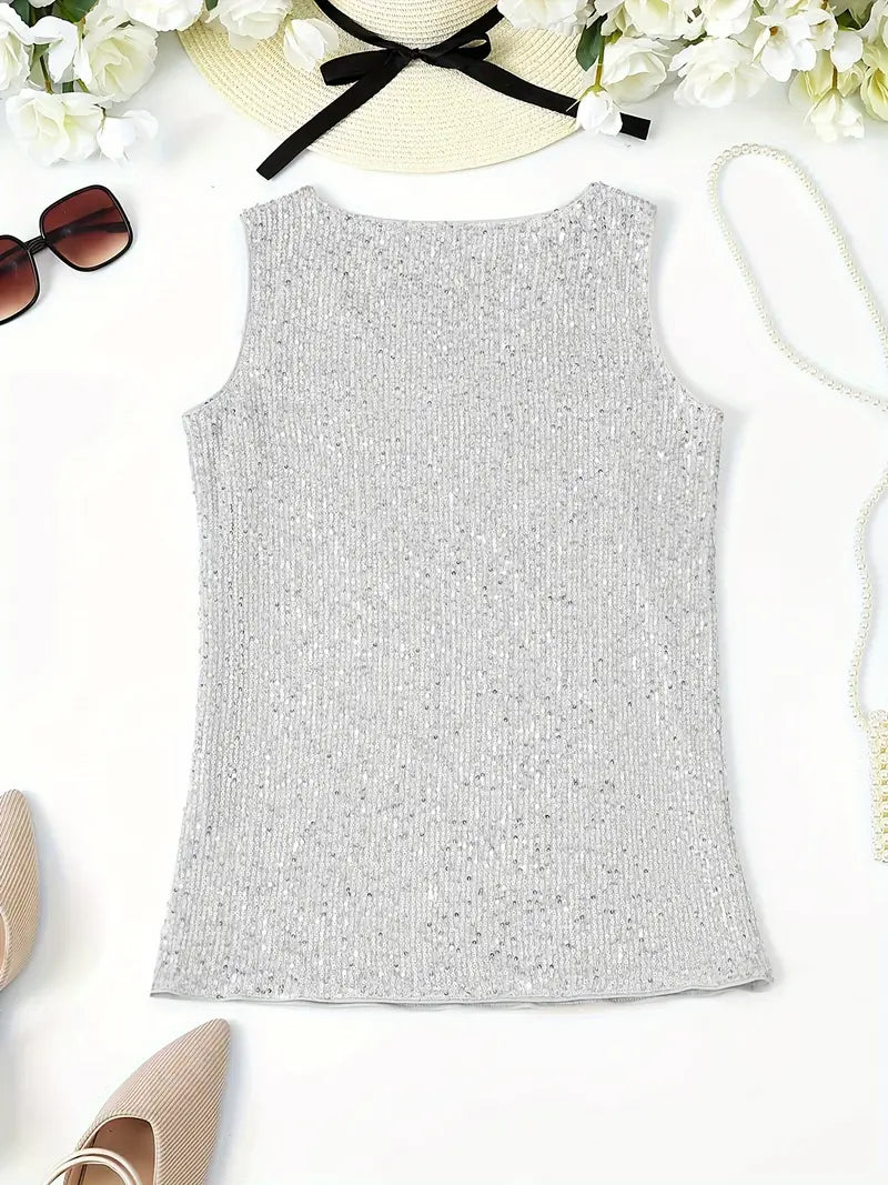 "Mouwloze top met V-hals, pailletten, elegante uitstraling, lichte stof; perfect voor zomer en avondjes uit."