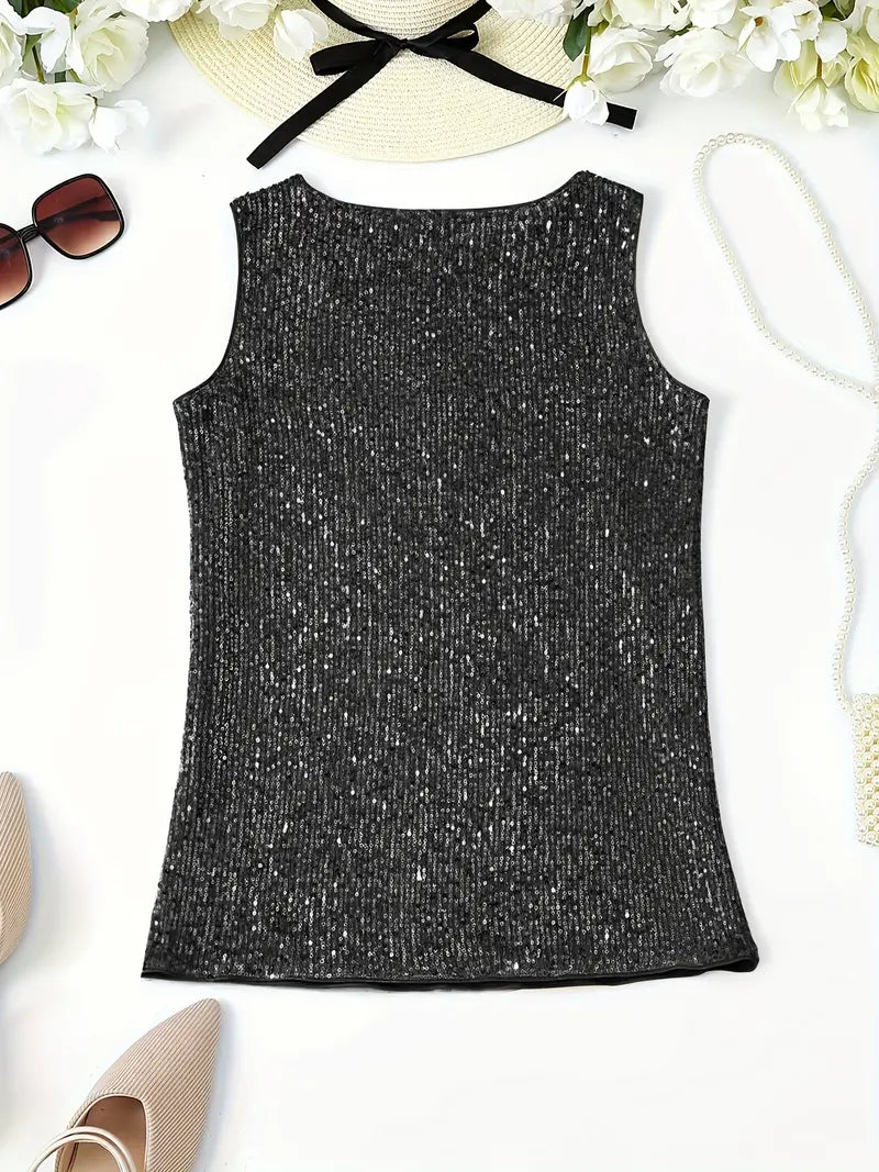"Mouwloze top met V-hals, pailletten, elegante uitstraling, lichte stof; perfect voor zomer en avondjes uit."