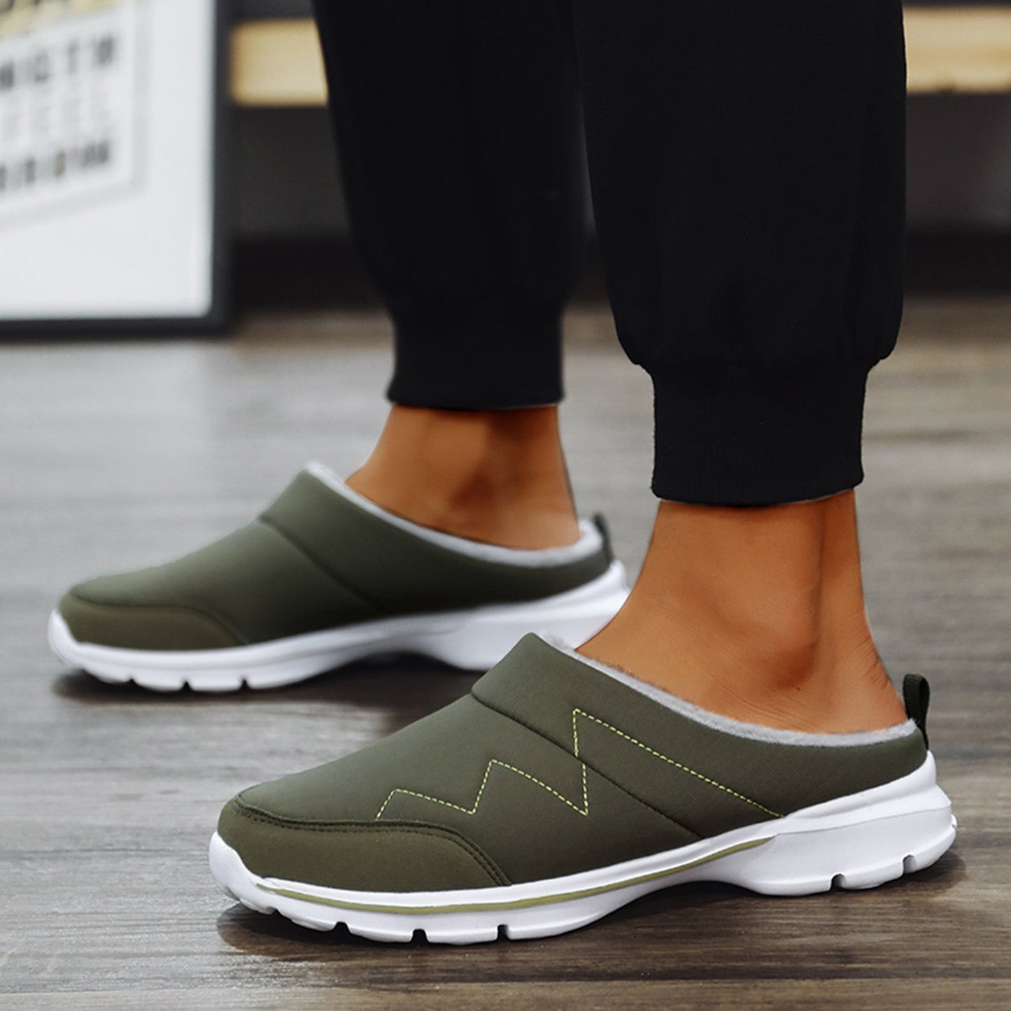 Orthopedische herenpantoffels met ergonomisch voetbed en zachte voering, zwart, ideaal voor herfst- en wintercomfort.