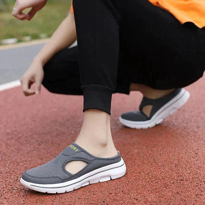"Orthopedische herenslippers, gebreid bovenwerk, ergonomische zool, zwart-grijs-wit, stijlvol en comfortabel, slip-on ontwerp