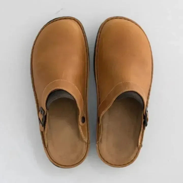 "Orthopedische leren heren pantoffels, luxe en stijlvol design met open hiel en antislip zool voor ultiem comfort."