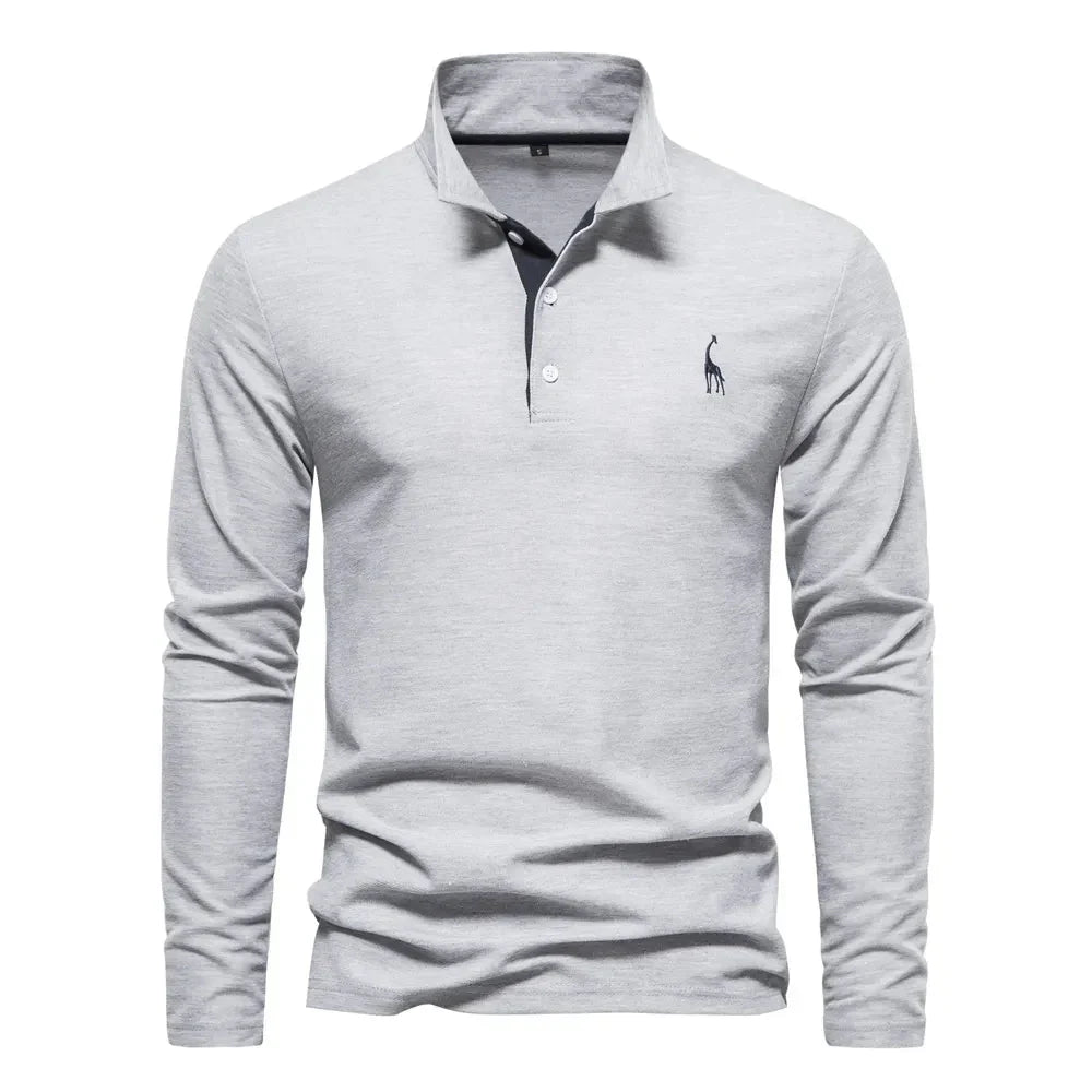 "Poloshirt heren, lange mouwen, stijlvol borduursel, elegante kraag, donkerblauwe stof, geschikt voor casual en formeel."