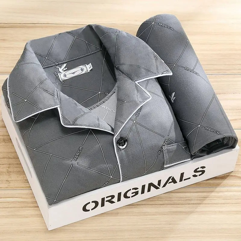 "Pyjama set voor mannen met knoopsluiting, stijlvol gestreept patroon en zachte stof voor ultiem slaapcomfort."