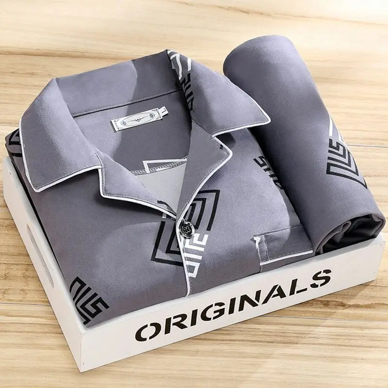"Pyjama set voor mannen met knoopsluiting, stijlvol gestreept patroon en zachte stof voor ultiem slaapcomfort."
