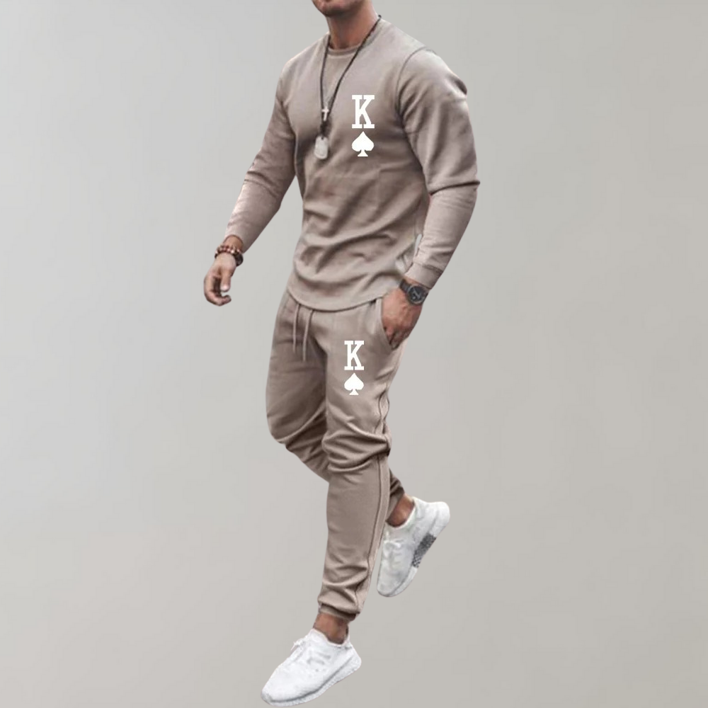 "Stijlvol en comfortabel heren trainingspak, slim-fit met ritssluiting, verkrijgbaar in groen, zwart, khaki en wit."