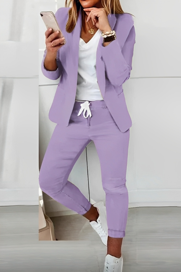 "Stijlvolle 2-delige dames blazer set, antraciet, met strakke snit en elegante pasvorm, geschikt voor zakelijke looks."