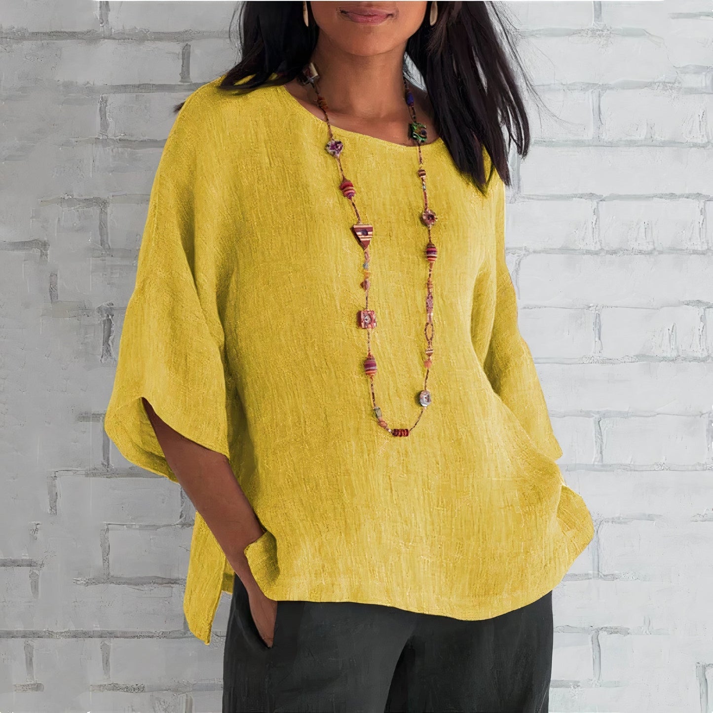 "Stijlvolle ademende linnen blouse voor vrouwen in blauw, geel of grijs, ideaal voor casual en formele outfits."