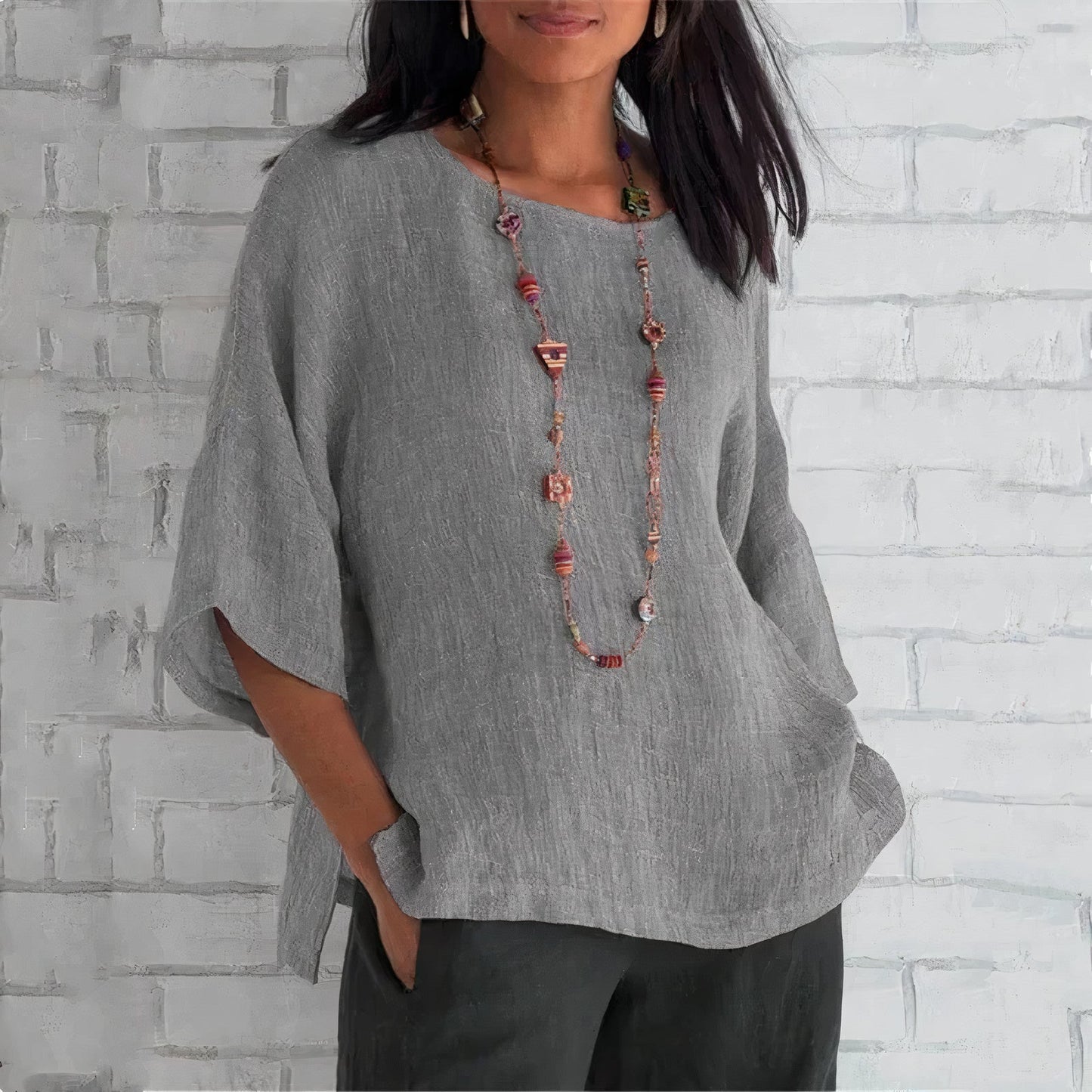 "Stijlvolle ademende linnen blouse voor vrouwen in blauw, geel of grijs, ideaal voor casual en formele outfits."