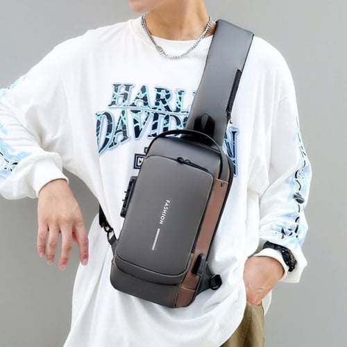 "Stijlvolle anti-diefstal crossbody tas voor dames in zwart, met verstopte ritsen en USB-poort, lakleer en polyester."