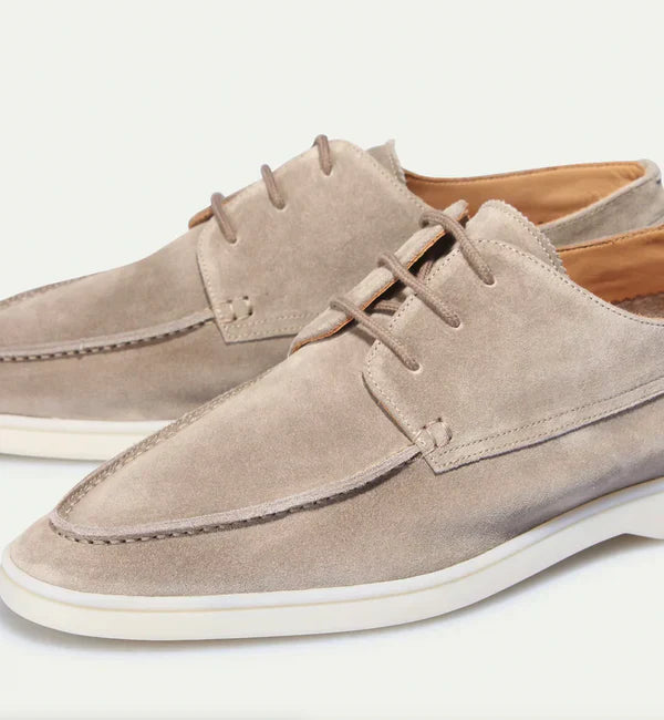 "Stijlvolle heren suède instappers, elegante afwerking en comfortabele pasvorm, ideaal voor zowel zakelijk als casual gebruik