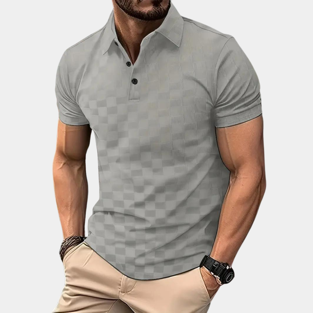 "Stijlvolle lichtblauwe polo voor heren, korte mouwen, perfecte zomerkleding. Comfortabel en elegant ontwerp."