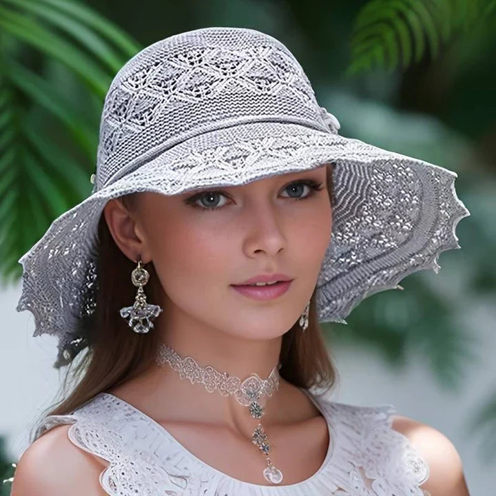 Stijlvolle Odessa zonnehoed met brede rand en elegante uitstraling, ideaal voor zomerse dagen; biedt UV-bescherming.