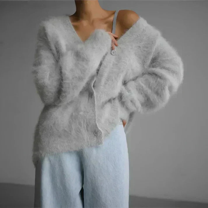 "Stijlvolle oversized kasjmieren trui, luxueus en comfortabel, met moderne pasvorm en zachte textuur, ideaal voor winterdagen