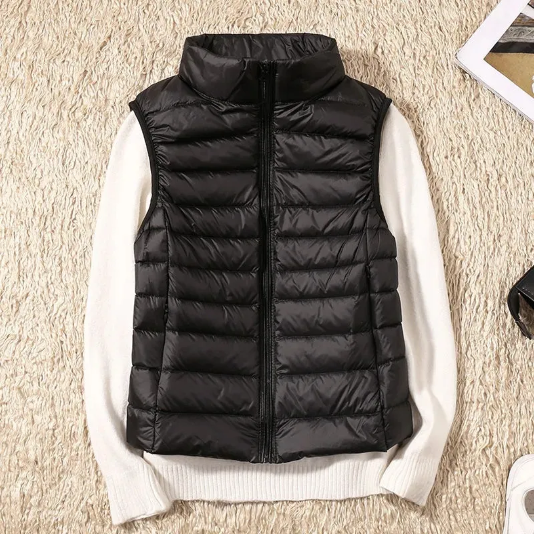 "Stijlvolle winddichte dames bodywarmer in rood, lichtgewicht met slank design, geschikt voor elke modebewuste vrouw."