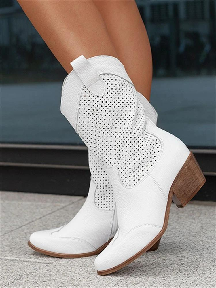 Stijlvolle witte dames cowboylaarzen met perforatiedetails en blokhak, perfect voor modieuze en comfortabele stappen.