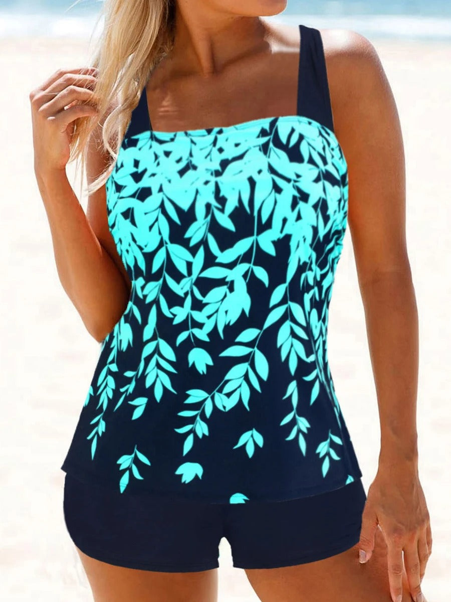 "Trendy tankini set met short in levendige kleuren, losvallende top en praktische short voor comfort en stijl bij strand of z