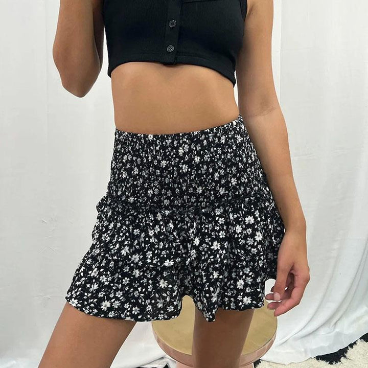"Vrolijke kleurrijke damesrok met boho-print, elastische tailleband, luchtig ontwerp geschikt voor lente en zomer."