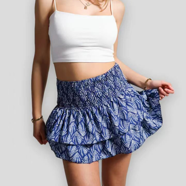 "Vrolijke kleurrijke damesrok met boho-print, elastische tailleband, luchtig ontwerp geschikt voor lente en zomer."