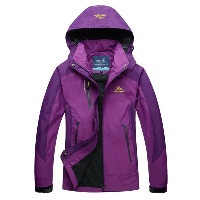 "Waterdichte outdoor jas met capuchon, unisex, blauw, wind- en waterdicht, ideaal voor avontuurlijk gebruik."