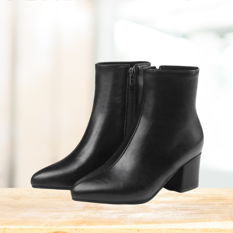 "Zilveren dames enkellaarsjes met glanzende metallic afwerking, enkelhoogte, geschikt voor casual en elegante outfits."