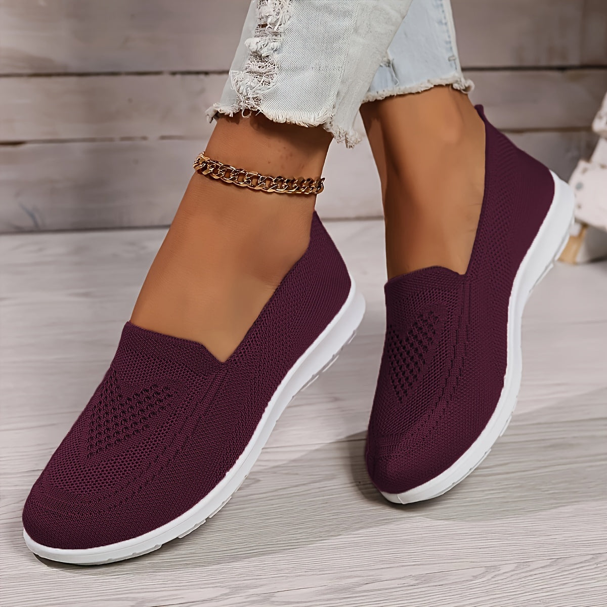 "Zwarte orthopedische dames instappers, elegant ontwerp, ademend bovenwerk, slip-on stijl, ideaal voor comfort en steun."