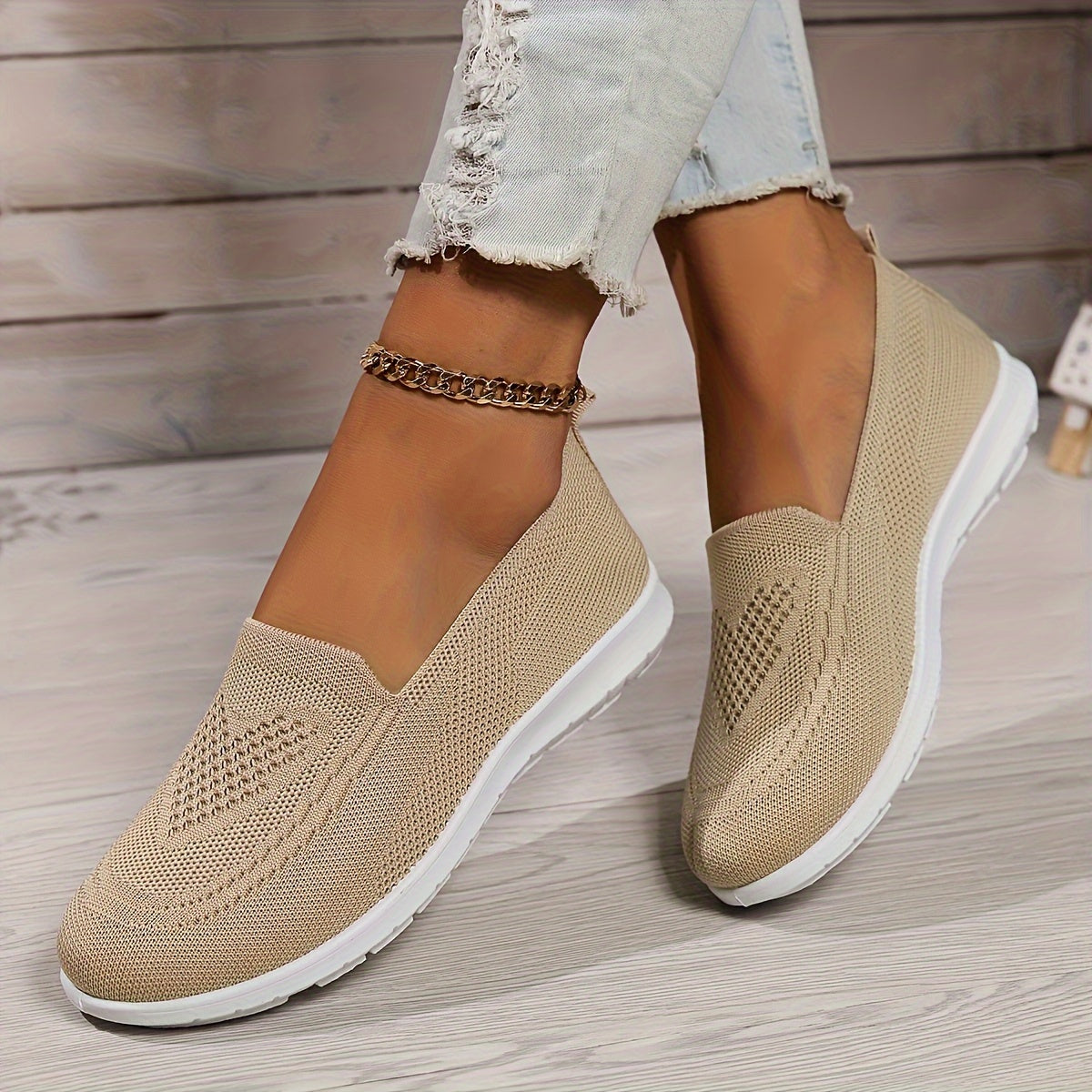 "Zwarte orthopedische dames instappers, elegant ontwerp, ademend bovenwerk, slip-on stijl, ideaal voor comfort en steun."