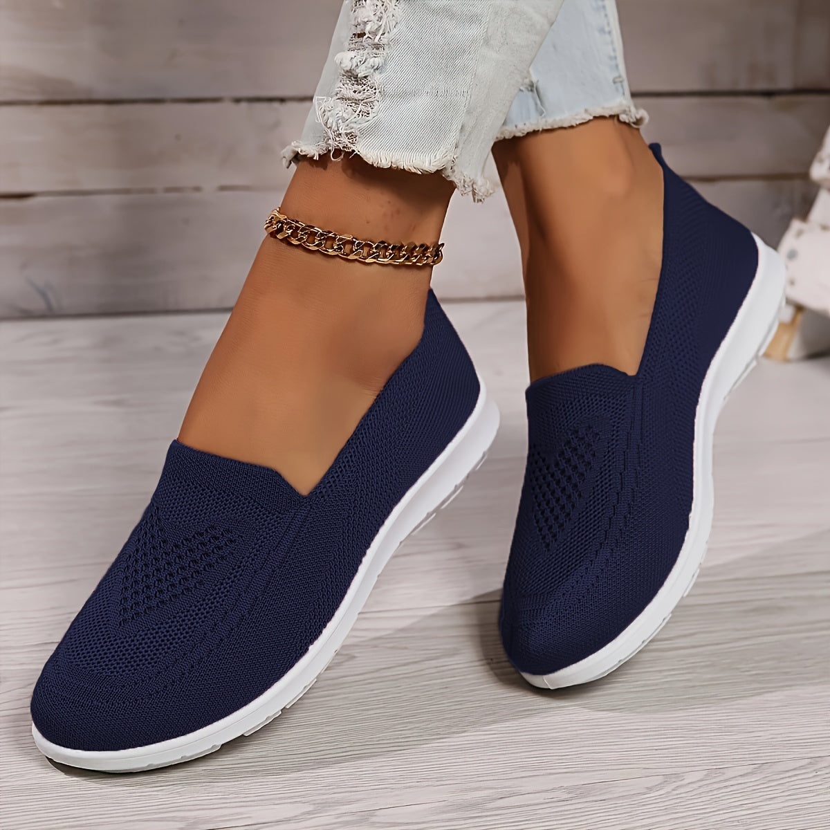 "Zwarte orthopedische dames instappers, elegant ontwerp, ademend bovenwerk, slip-on stijl, ideaal voor comfort en steun."