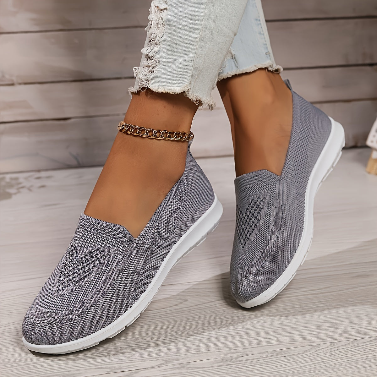 "Zwarte orthopedische dames instappers, elegant ontwerp, ademend bovenwerk, slip-on stijl, ideaal voor comfort en steun."