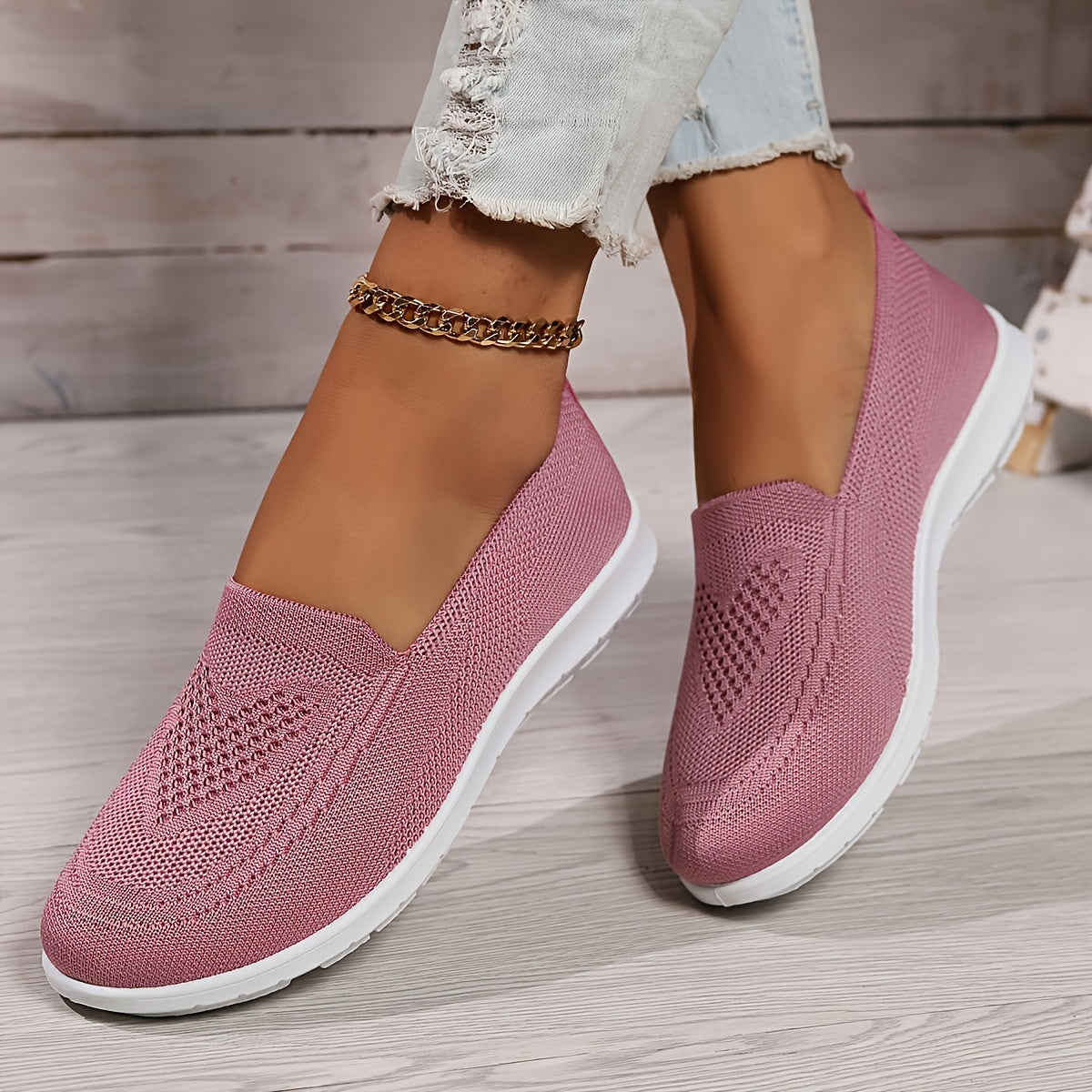 "Zwarte orthopedische dames instappers, elegant ontwerp, ademend bovenwerk, slip-on stijl, ideaal voor comfort en steun."