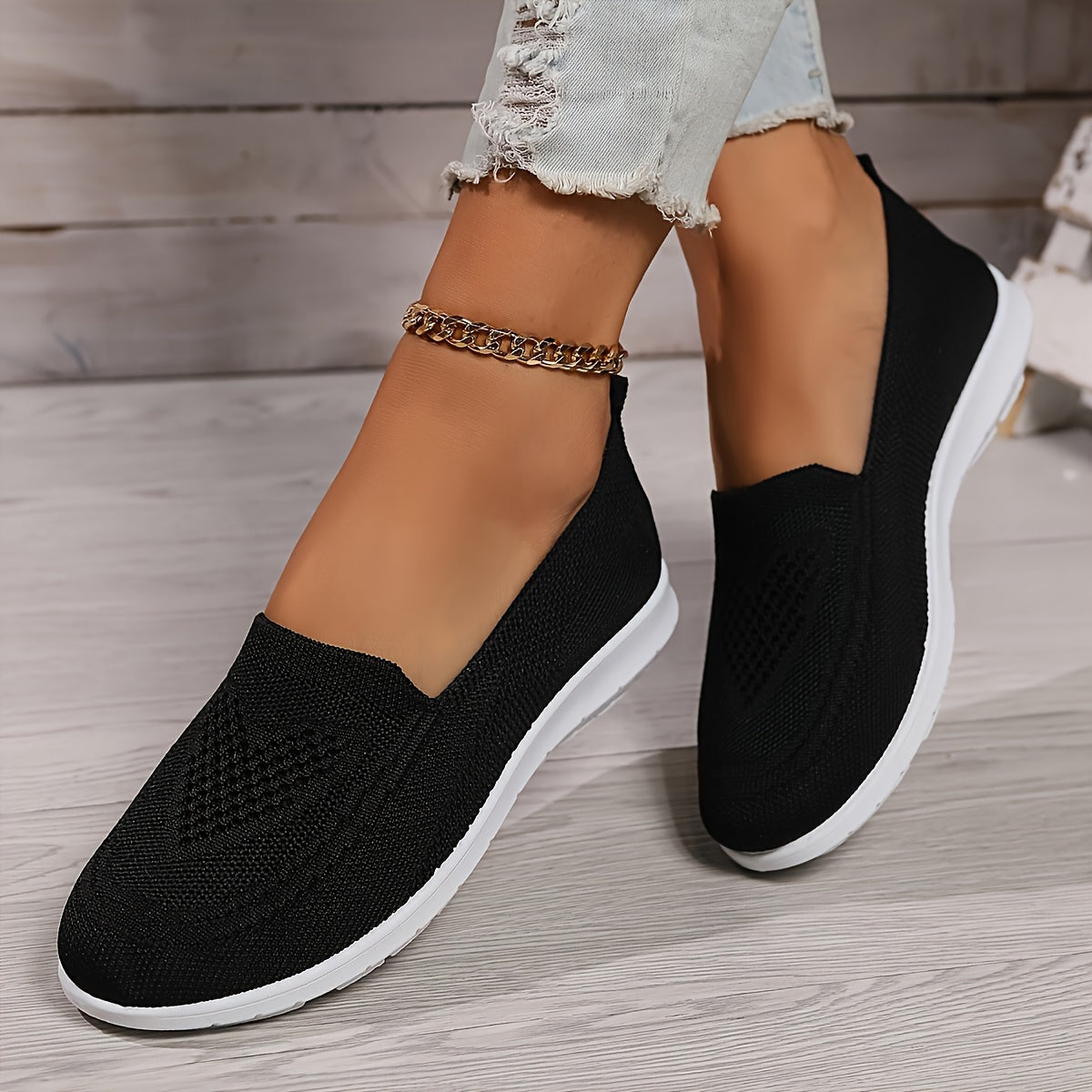 "Zwarte orthopedische dames instappers, elegant ontwerp, ademend bovenwerk, slip-on stijl, ideaal voor comfort en steun."