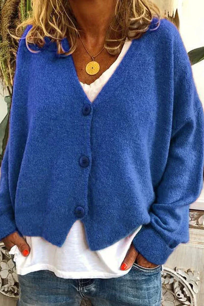 "Aspen vest voor dames met V-hals, gebreid patchwork, levendige kleuren en knusse textuur, stijlvol en comfortabel."