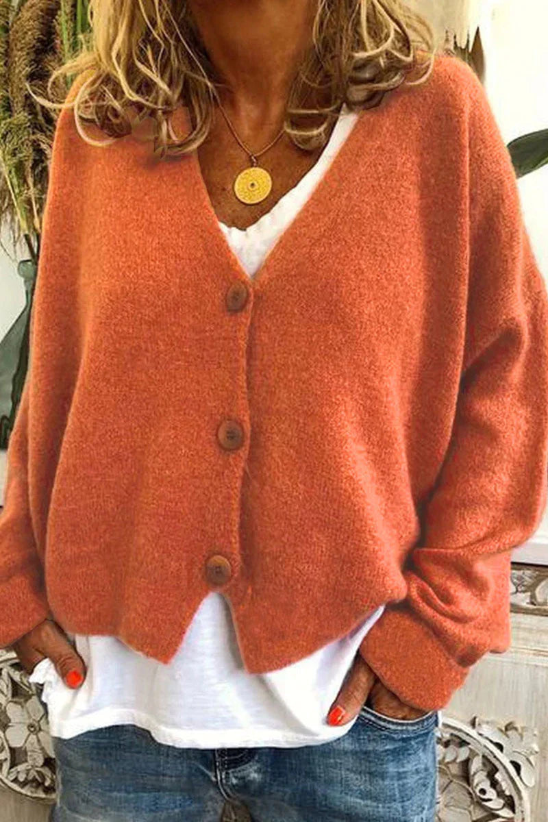 "Aspen vest voor dames met V-hals, gebreid patchwork, levendige kleuren en knusse textuur, stijlvol en comfortabel."