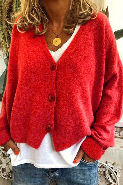 "Aspen vest voor dames met V-hals, gebreid patchwork, levendige kleuren en knusse textuur, stijlvol en comfortabel."