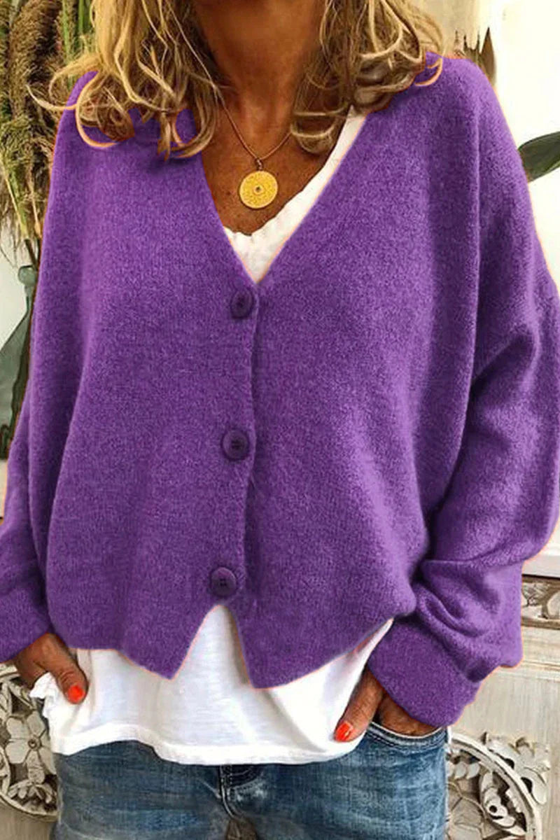 "Aspen vest voor dames met V-hals, gebreid patchwork, levendige kleuren en knusse textuur, stijlvol en comfortabel."