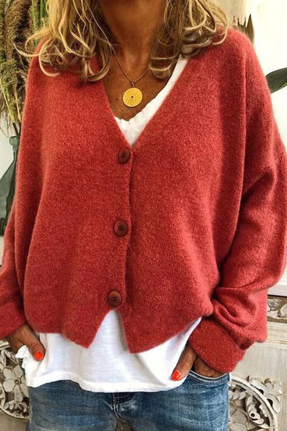 "Aspen vest voor dames met V-hals, gebreid patchwork, levendige kleuren en knusse textuur, stijlvol en comfortabel."