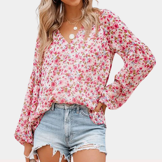 Blouse met lange mouw in roze, wit en groen, kleurrijke bloemenprint, losvallende pasvorm voor zomerse dagen. Damesbloes.