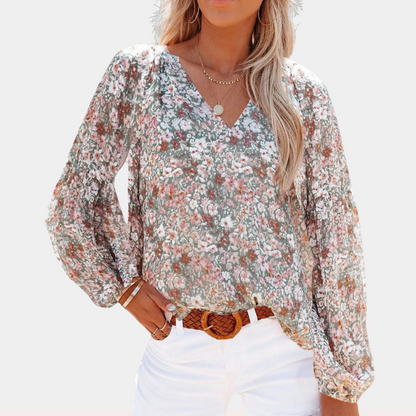 Blouse met lange mouw in roze, wit en groen, kleurrijke bloemenprint, losvallende pasvorm voor zomerse dagen. Damesbloes.