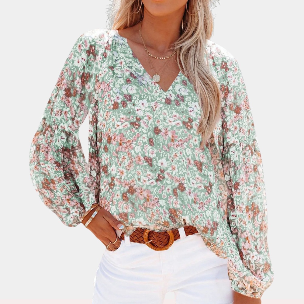 Blouse met lange mouw in roze, wit en groen, kleurrijke bloemenprint, losvallende pasvorm voor zomerse dagen. Damesbloes.