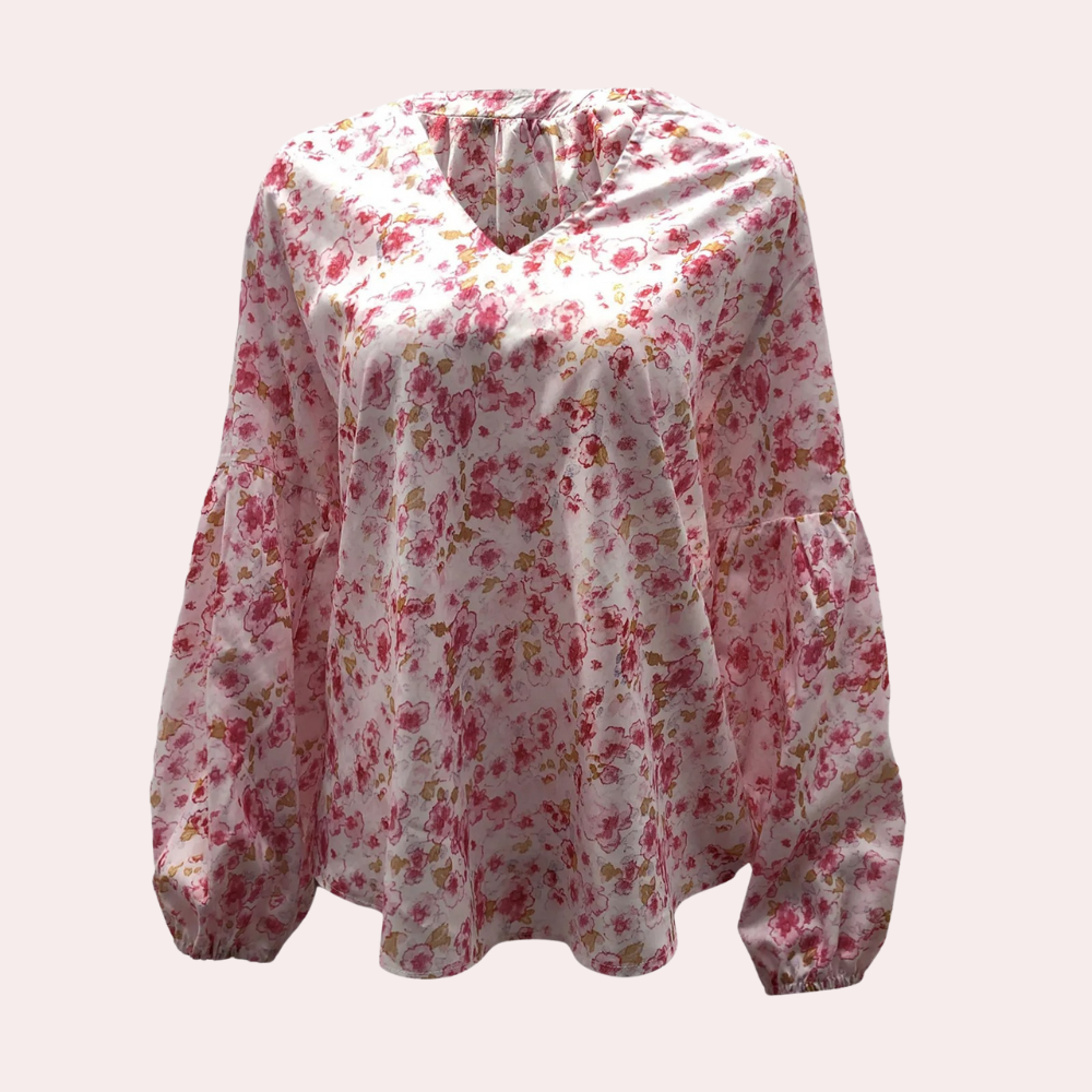 Blouse met lange mouw in roze, wit en groen, kleurrijke bloemenprint, losvallende pasvorm voor zomerse dagen. Damesbloes.