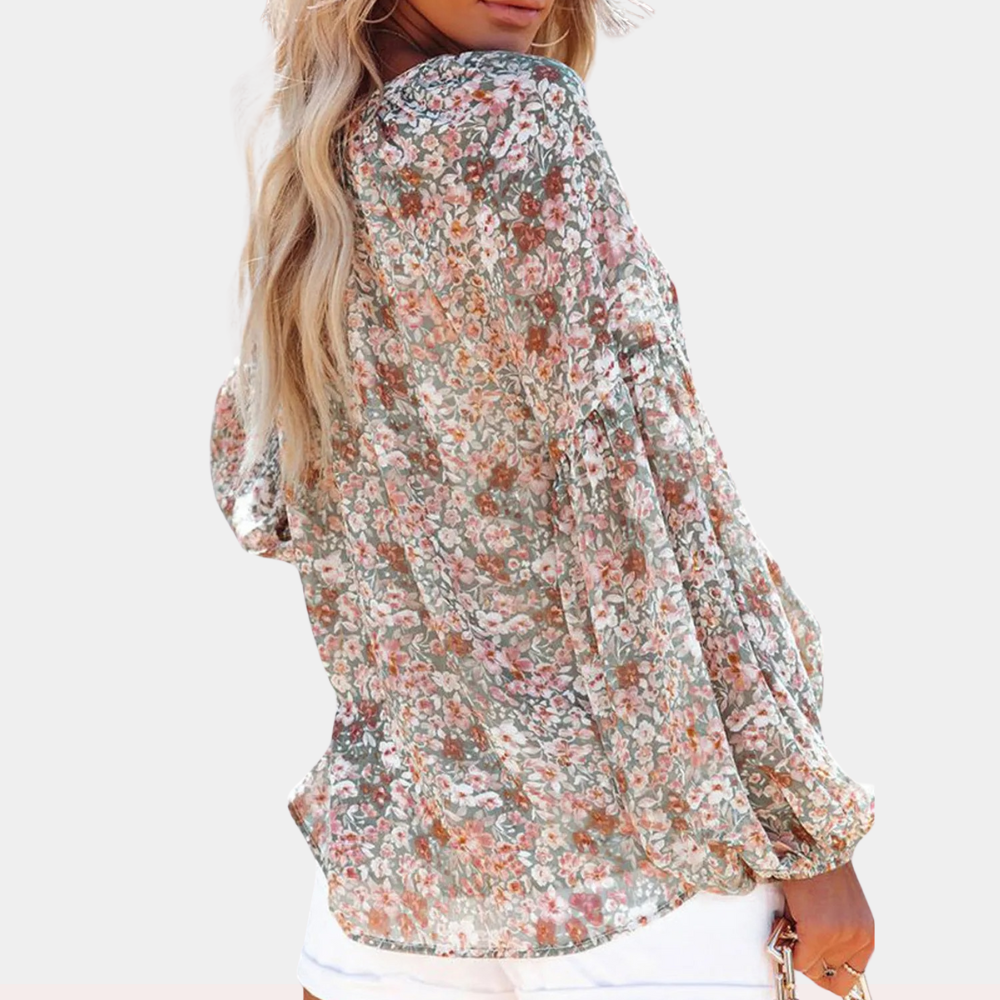Blouse met lange mouw in roze, wit en groen, kleurrijke bloemenprint, losvallende pasvorm voor zomerse dagen. Damesbloes.
