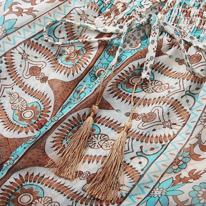 "Bohemian maxi jurk, paisley patroon, V-hals, volumineuze mouwen, elegante tailleband, ideaal voor zomerse dag"