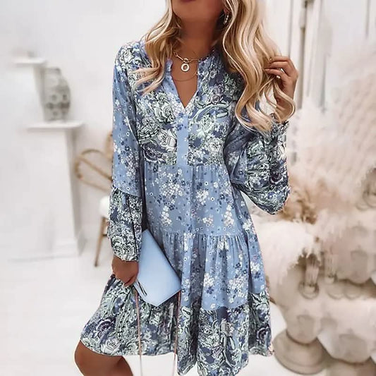 Boho zomerjurk dames met kleurrijke print, V-hals, flairmouwen en midi lengte, ideaal voor zomerse gelegenheden.